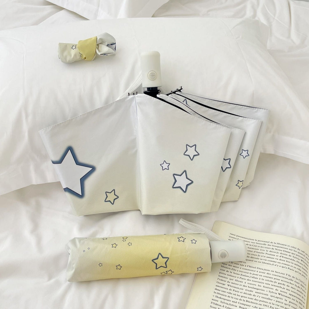 Women's compact folding umbrella with star pattern Kalsten