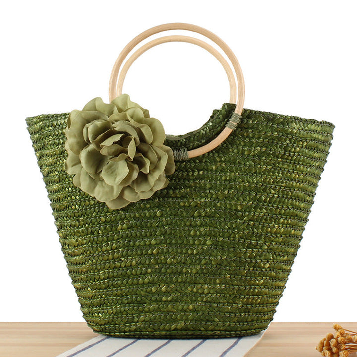 Braided straw bag with floral accent Kalsten