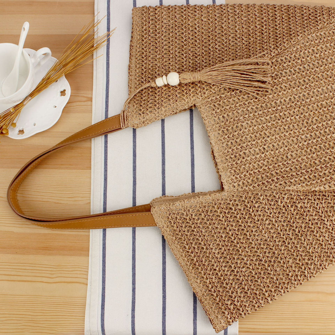 Handbag Made of Handwoven Raffia with Elegant Leather Accents Kalsten