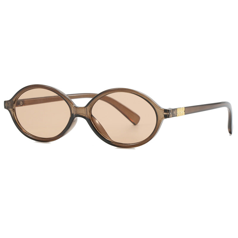 Women's fashionable sunglasses with oval frame and golden accents Kalsten