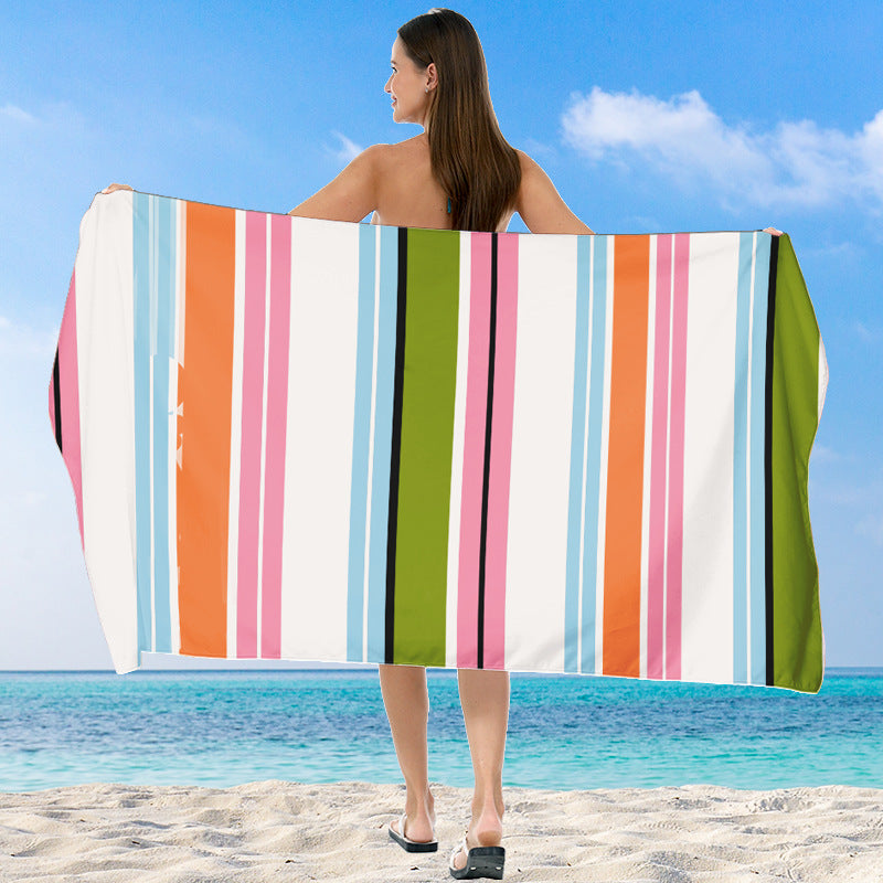 Beach towel with vibrant gradient color and stylish striped design Kalsten