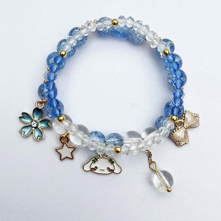 Elegant bracelet with animal and glitter pendants Kalsten