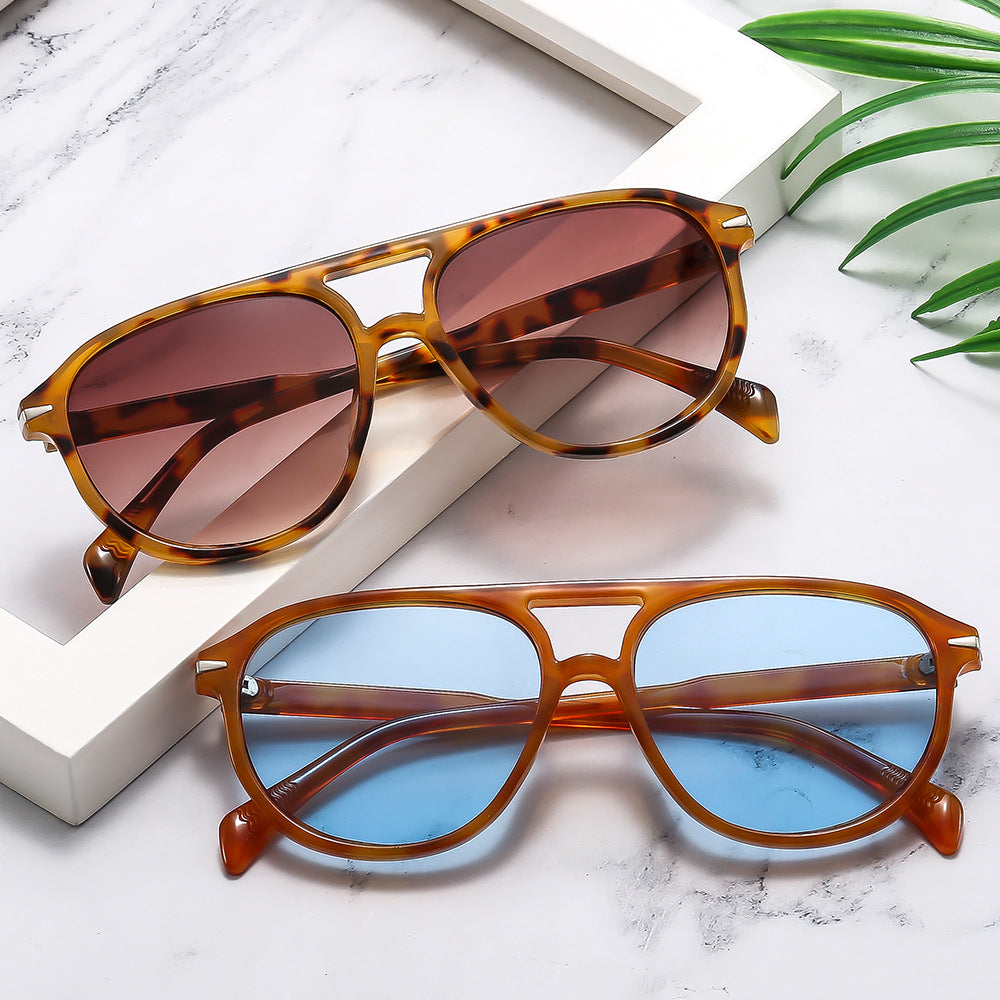 Ladies fashionable sunglasses with unique frame and high-protected lenses Kalsten