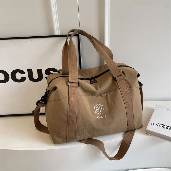 Sporty tote bag with multiple compartments and adjustable straps Kalsten