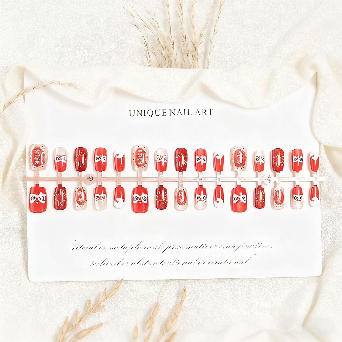 Fake nail set with unique animal motifs and elegant accents Acalora
