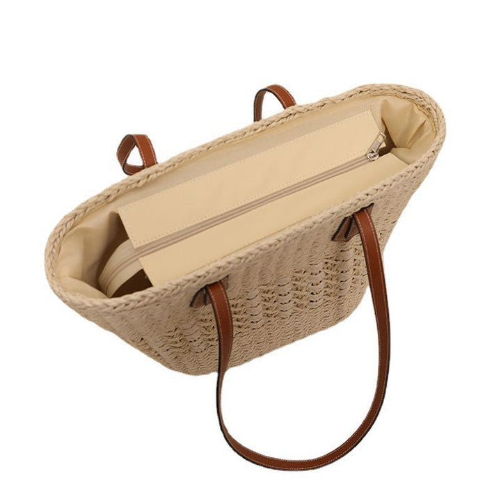 Handcrafted rattan basket bag with elegant leather accents Kalsten