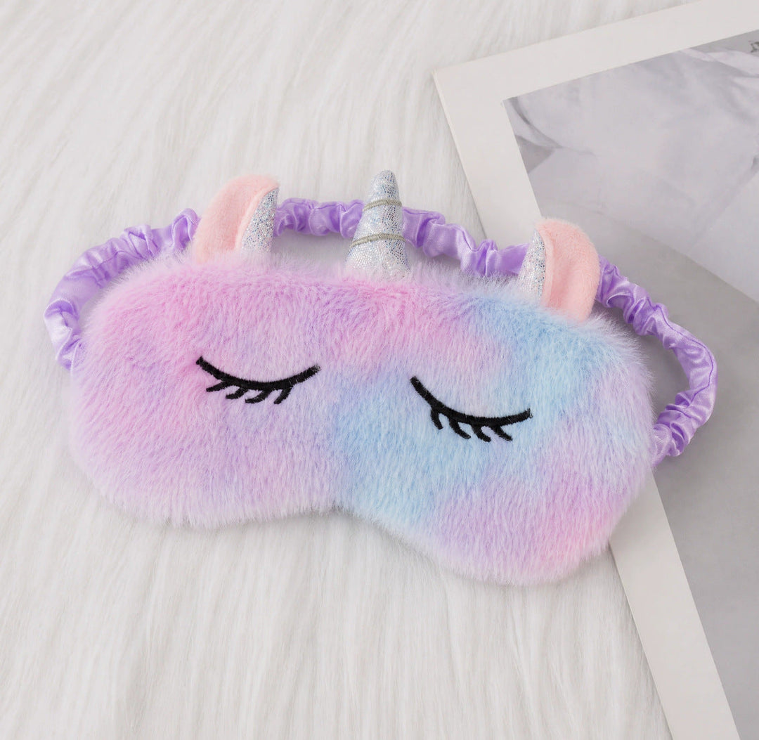 Women's plush-filled unicorn sleep mask with 3D horn, embroidered eyelashes and adjustable satin band Kalsten