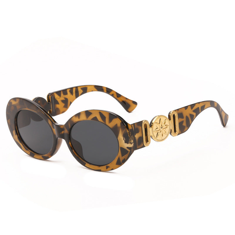 Ladies fashionable sunglasses with striking golden accents Kalsten