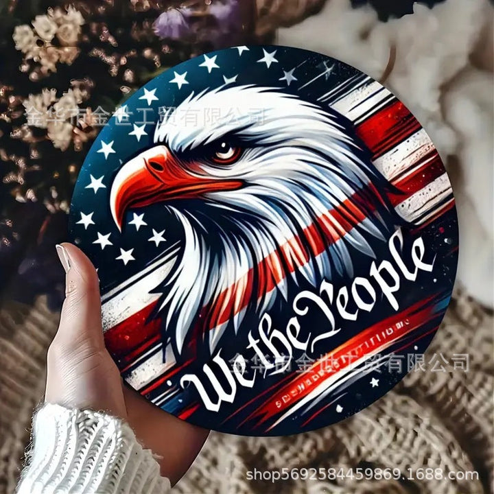 Independence Day rustic round wooden patriotic cross wall plaque with floral accents and God Bless America banner Kalsten