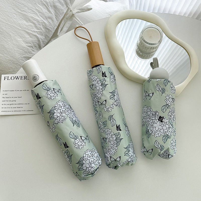 Women's Folding Umbrella with Innovative Floral Design Kalsten