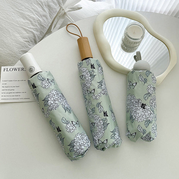 Women's Folding Umbrella with Innovative Floral Design Kalsten
