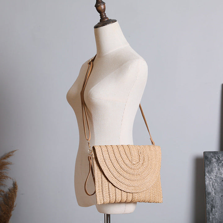 Handbag Made of High-Quality Woven Straw with Elegant Flap Closure Kalsten