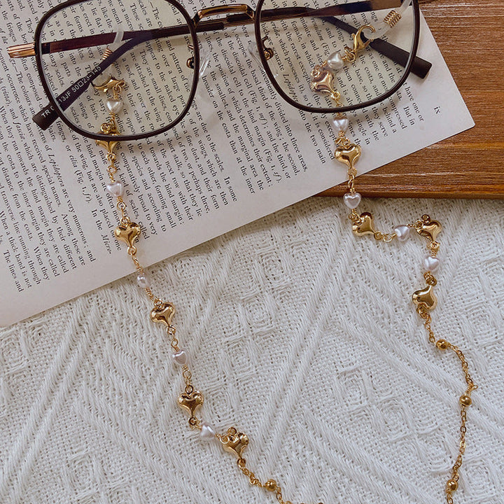 Fashionable necklace with pearls and golden accents Kalsten