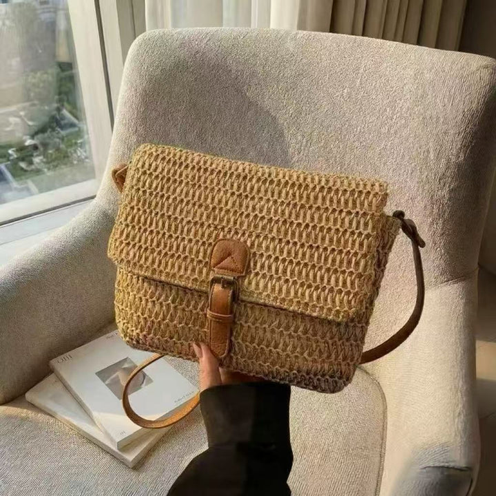 Handbag made of braided natural material with adjustable shoulder strap Kalsten