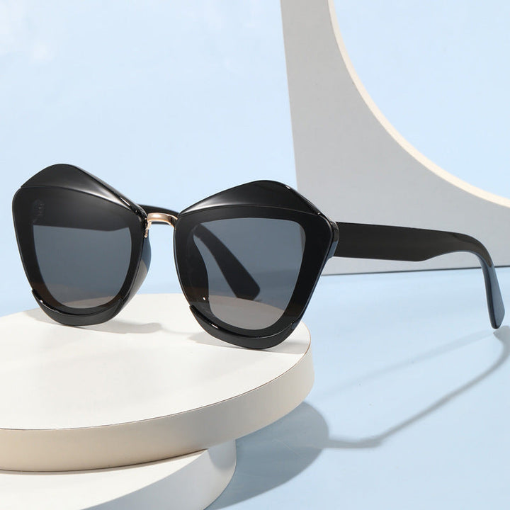Women striking designer sunglasses with extravagant frame Kalsten
