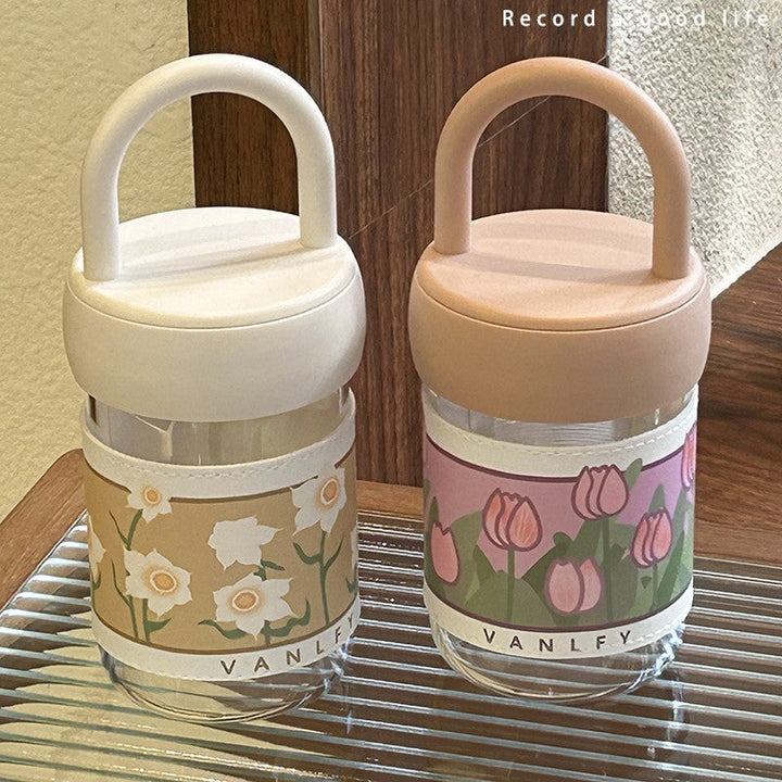 Women's insulated drinking bottle with ergonomic carrying handle and elegant flower design Kalsten