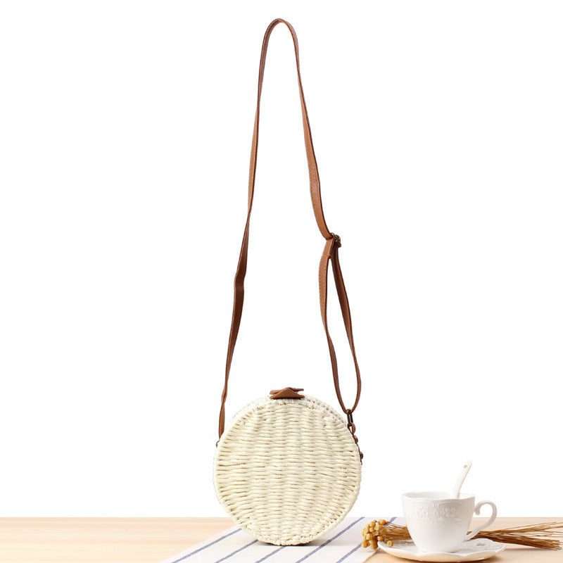 Round basket bag with leather accents Kalsten