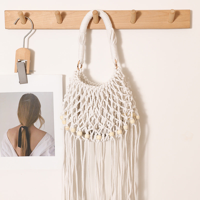Macrame bag with decorative fringes and wooden beads Kalsten
