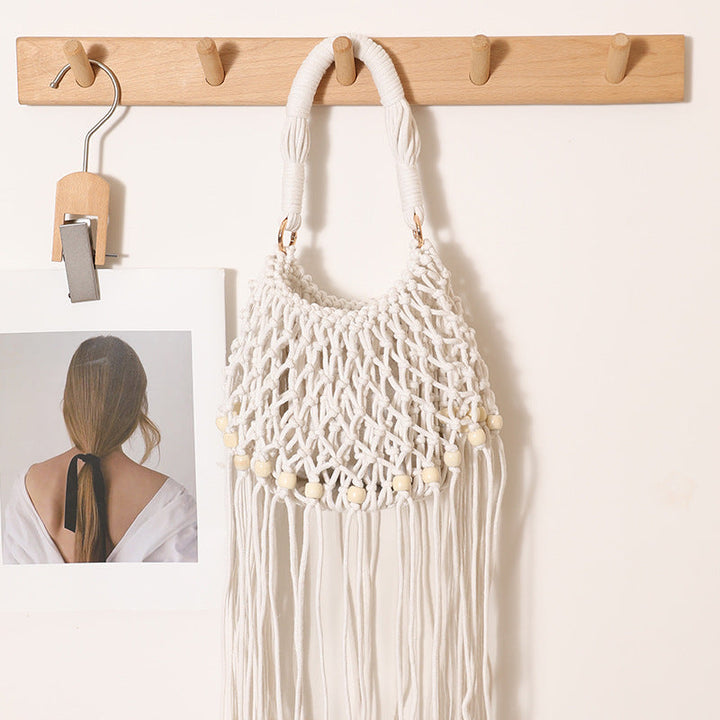 Macrame bag with decorative fringes and wooden beads Kalsten