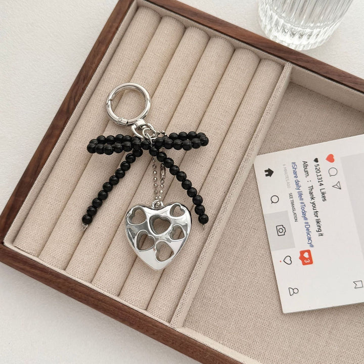 Heart-Shaped Charm Keychain with Beaded Bow Kalsten