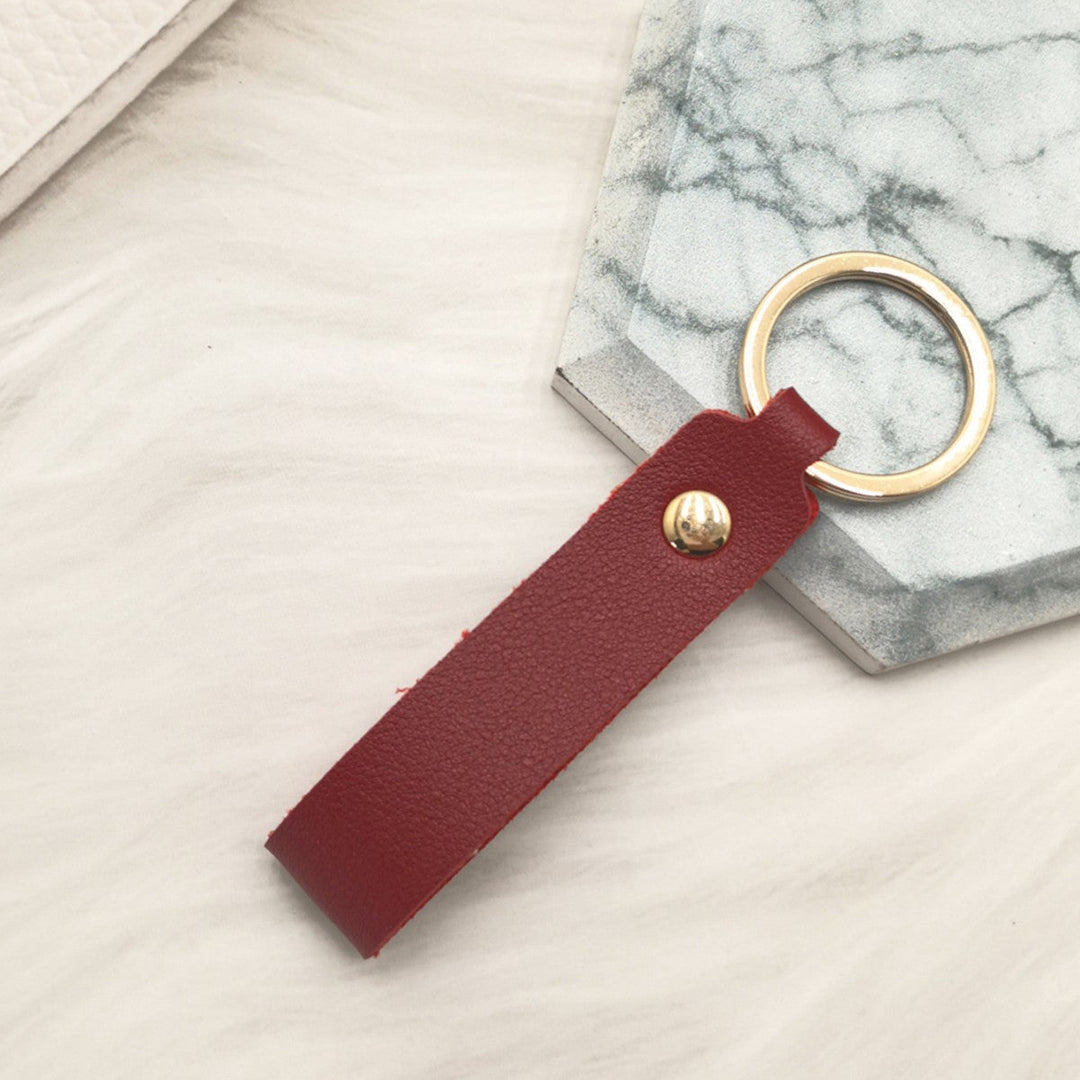 Unisex keychain made of high-quality synthetic leather with elegant metal embellishment Kalsten