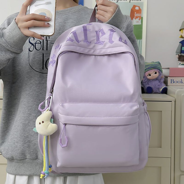 Fashionable backpack with removable charms Kalsten