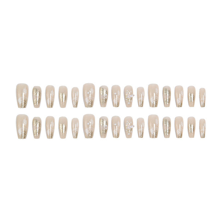Glamorous artificial nails with heart-shaped accents Kalsten