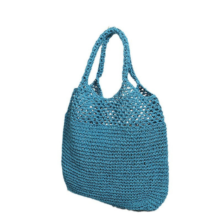 Handcrafted straw bag with wide carrying handle Kalsten