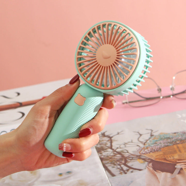 Ladies compact handheld fan with ergonomic grip, quiet brushless motor, and removable stand Kalsten