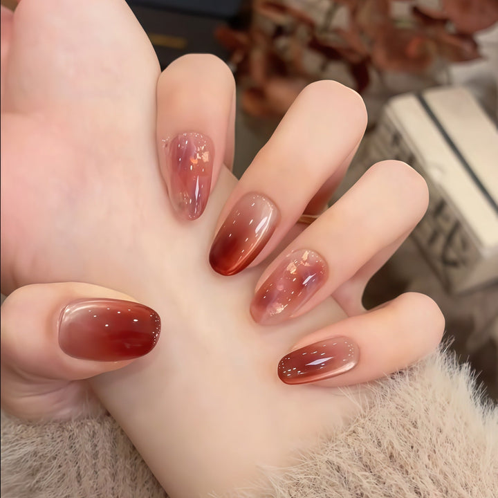 Artificial nails with elegant gradient and golden accents Kalsten