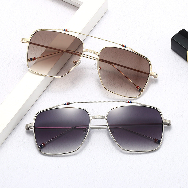 Ladies trendy curved glasses with narrow metal frame Kalsten