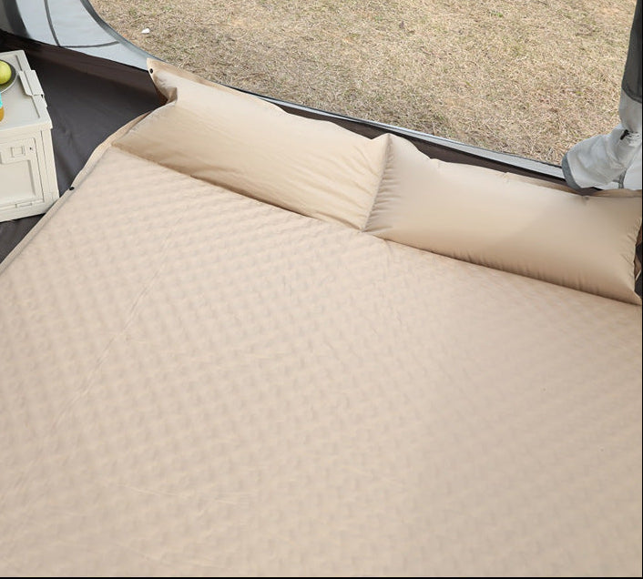 double connectable inflatable camping mattress with integrated dual pillows, egg-crate comfort surface and compact carry sack Kalsten