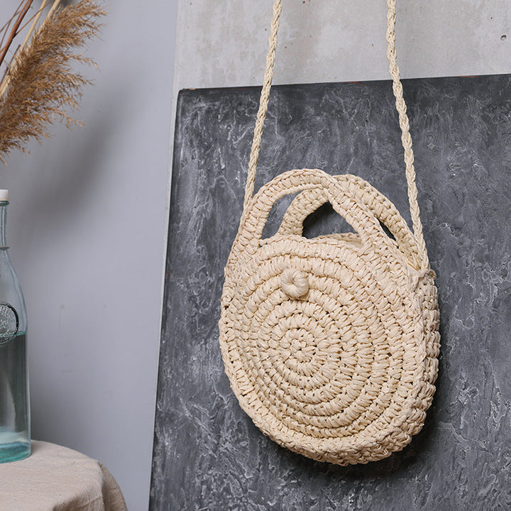 Handcrafted Round Wicker Bag with Elegant Closure Kalsten