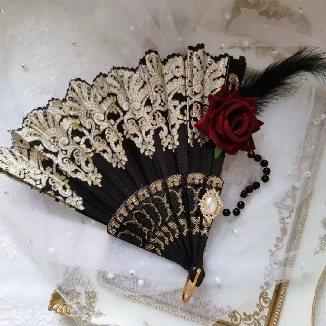 Women's fan with exquisite filigree ornamentation Kalsten
