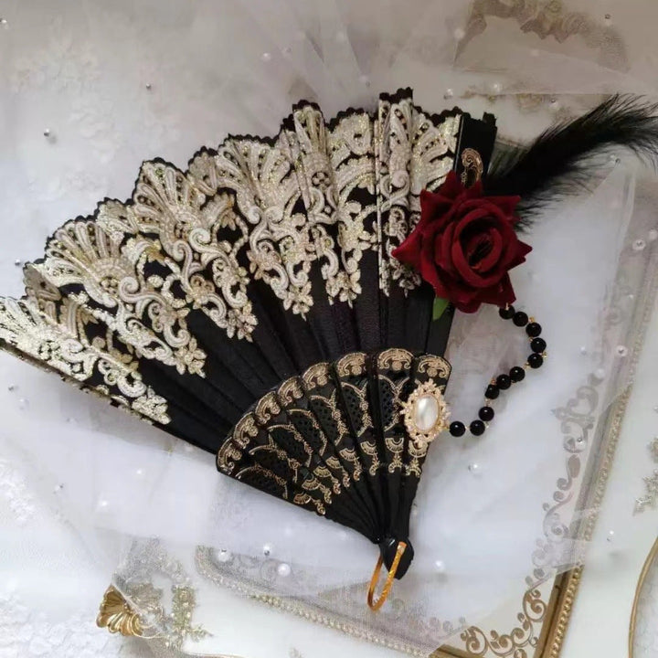 Women's fan with exquisite filigree ornamentation Kalsten