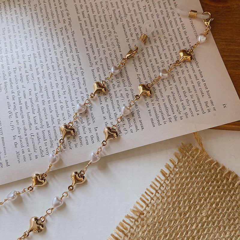 Fashionable necklace with pearls and golden accents Kalsten