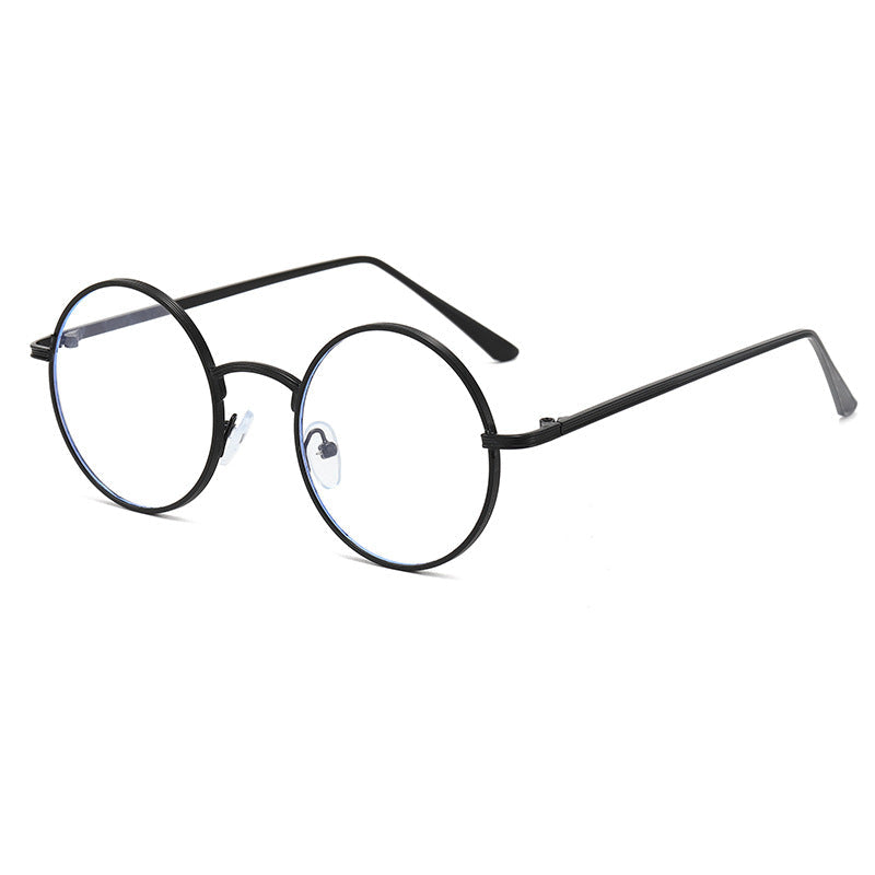 Ladies fashionable glasses with round lenses and fine metal frame Kalsten