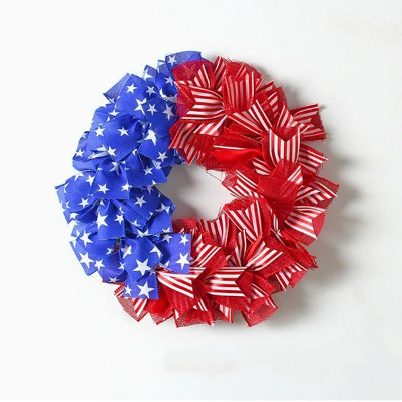 Unisex decorative door wreath with layered fabric bows and star appliqués Kalsten