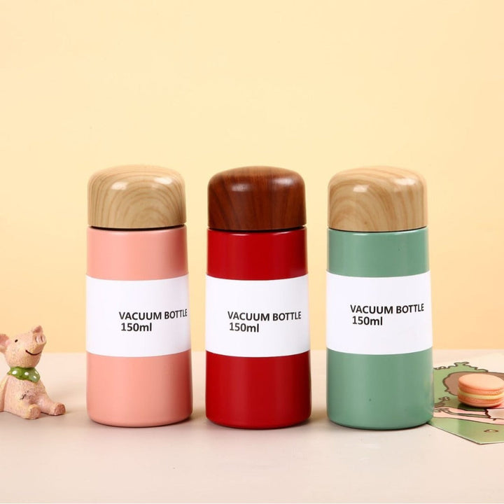 Women vacuum-insulated water bottle with innovative wooden lid Kalsten