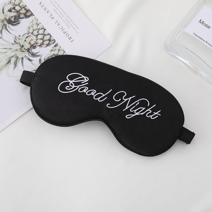 Unisex embroidered contoured sleep mask with decorative text embroidery and adjustable elastic band Kalsten
