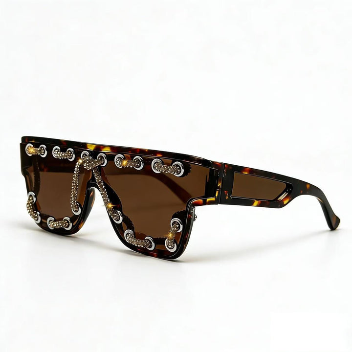 Ladies sunglasses with extravagant design and decorative chain embellishment Kalsten