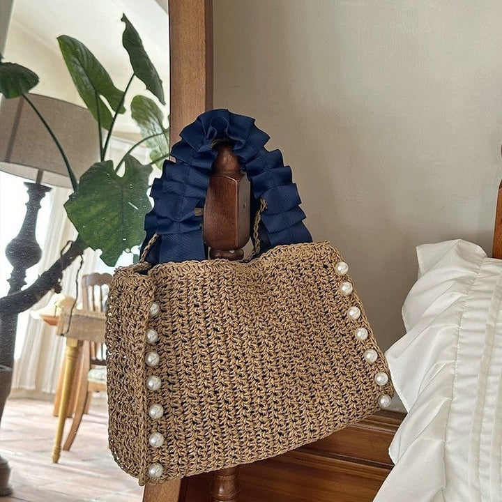 Fashionable straw bag with ruffle detail Kalsten