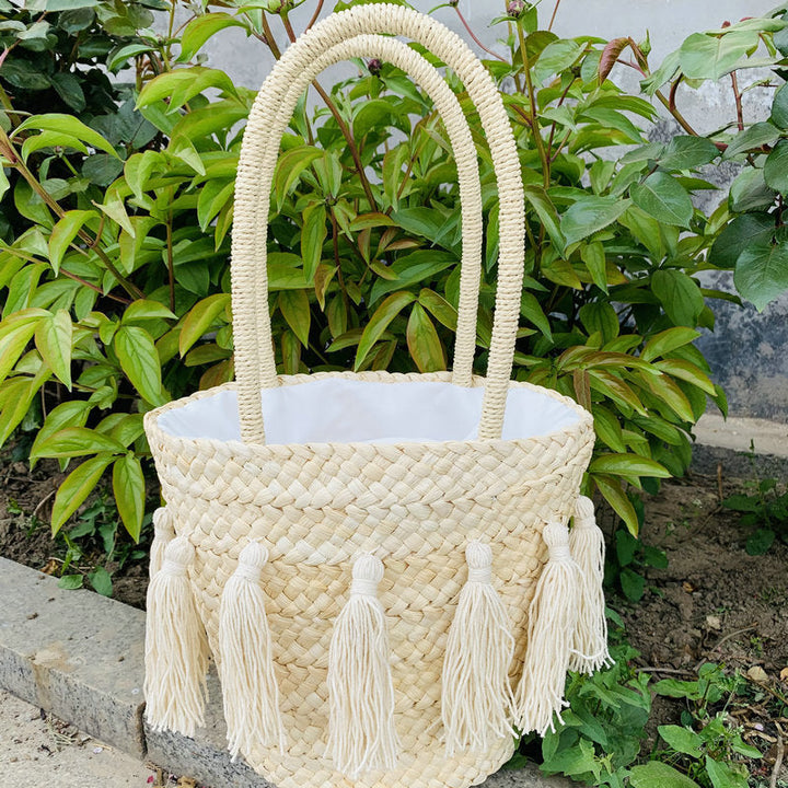 Trendy basket bag with tassels Kalsten