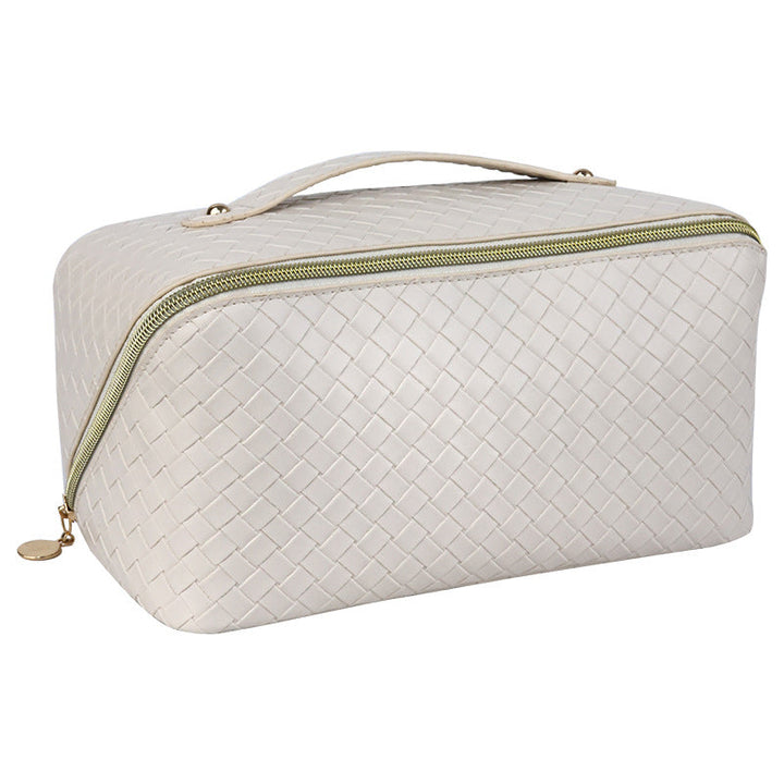 Cosmetic transport bag made of high-quality braided synthetic leather with practical zipper and carrying handle Kalsten