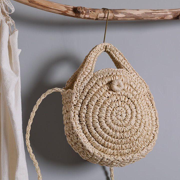 Handcrafted Round Wicker Bag with Elegant Closure Kalsten