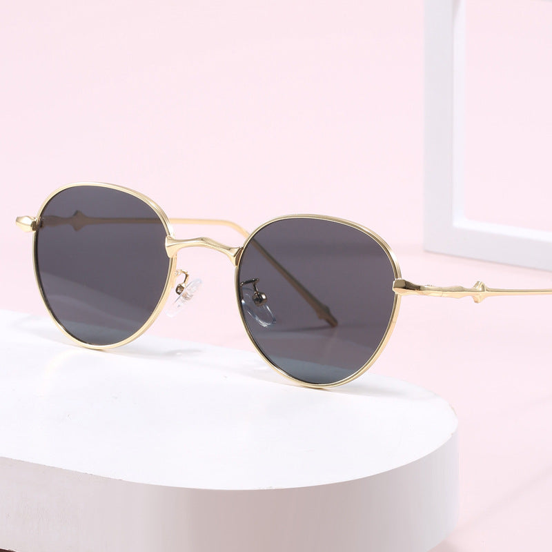 Ladies elegant round sunglasses with stylish metal frame Kalsten