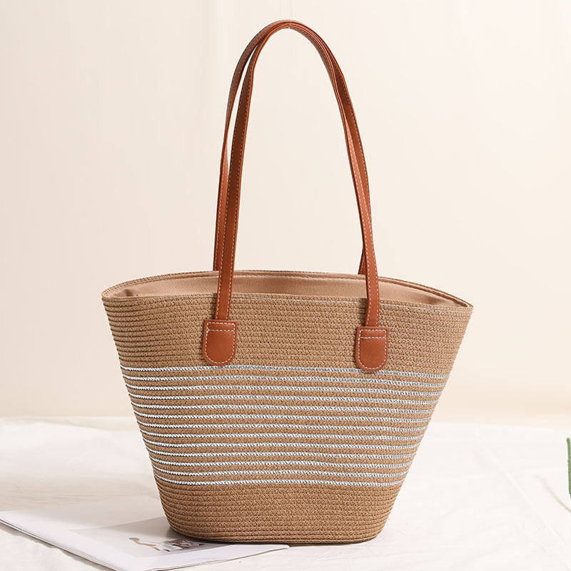 Elegant bast handbag with leather accents Kalsten