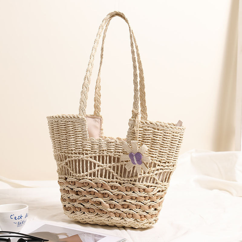 Braided basket bag with decorative flower appliqué Kalsten