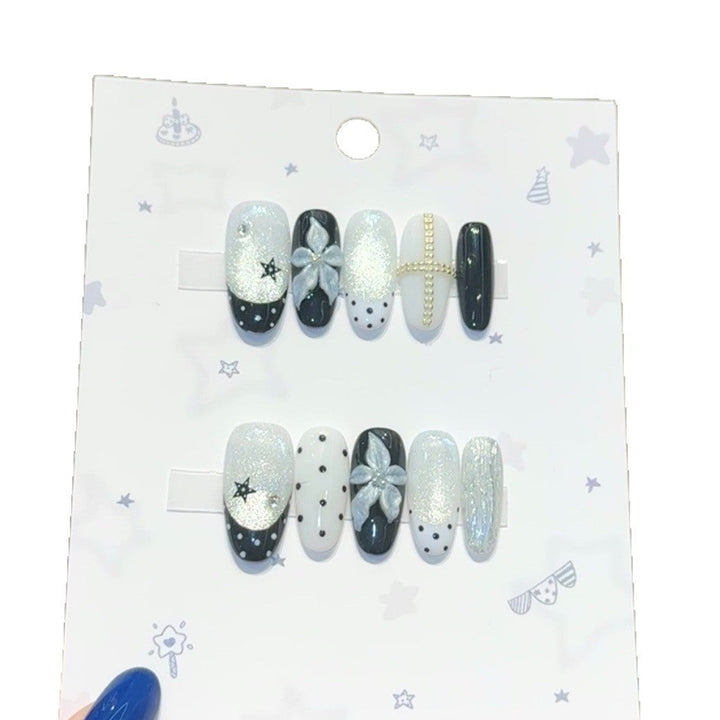 Glamorous artificial nail tips with floral accents Kalsten