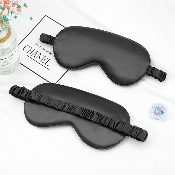 Women's breathable satin eye mask with ergonomic curvature, soft padding and gathered anti-slip band Kalsten